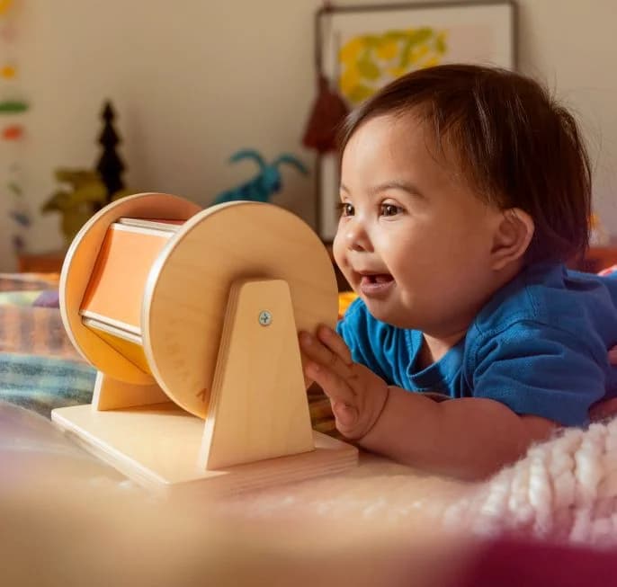 Child looking at toy